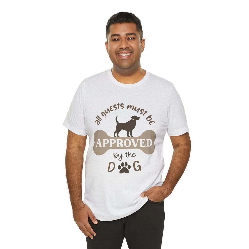 Man wearing a white t-shirt with a dog-themed graphic and text on a white background