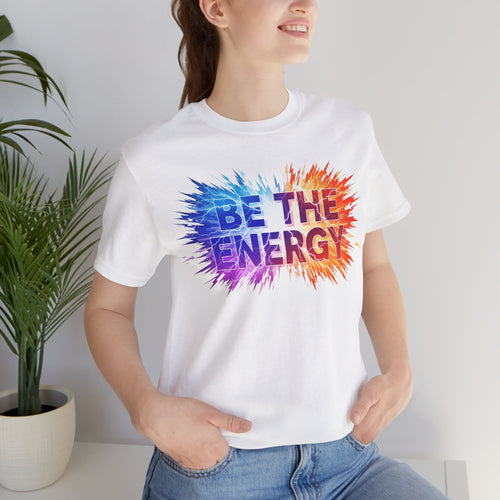 Elevor360 - Person wearing a white t-shirt with 'Be the Energy' colorful design.