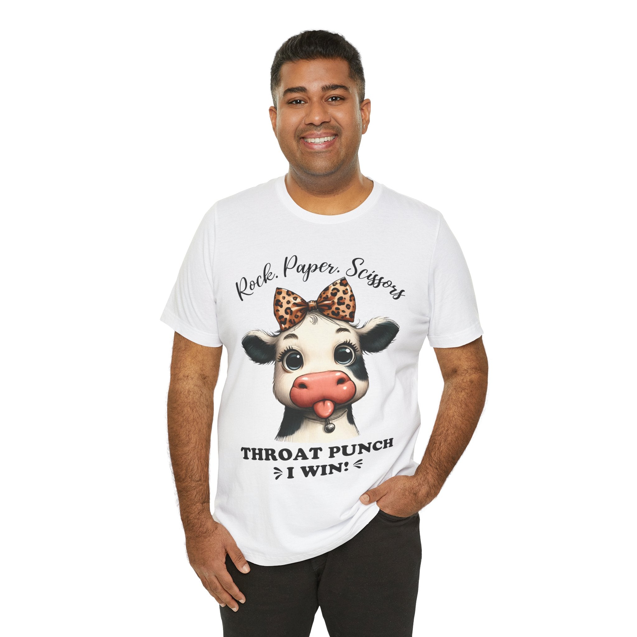 Man wearing a white t-shirt with a cow graphic and text on a white background