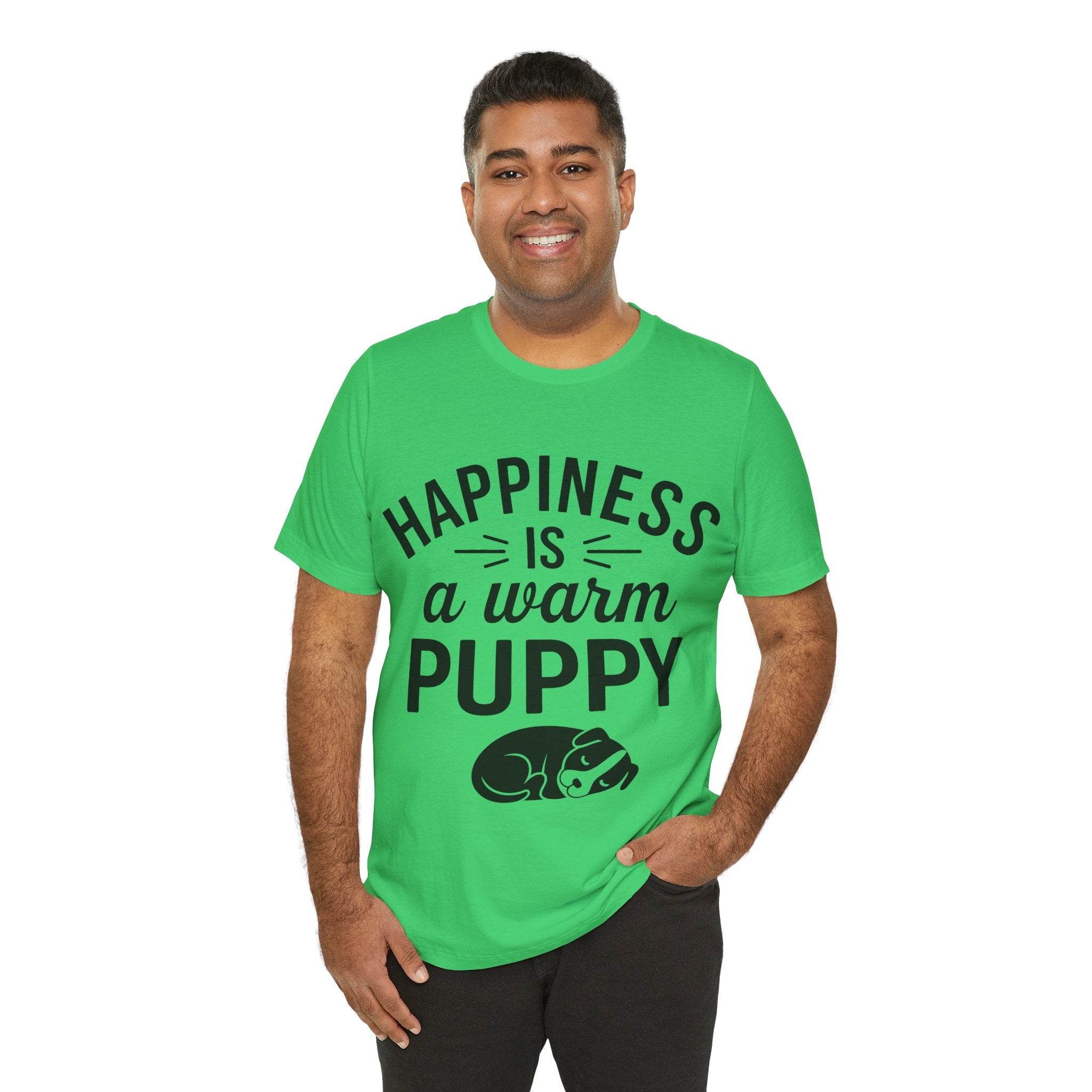 Man wearing a green t-shirt with 'Happiness is a warm puppy' text and graphic on a white background