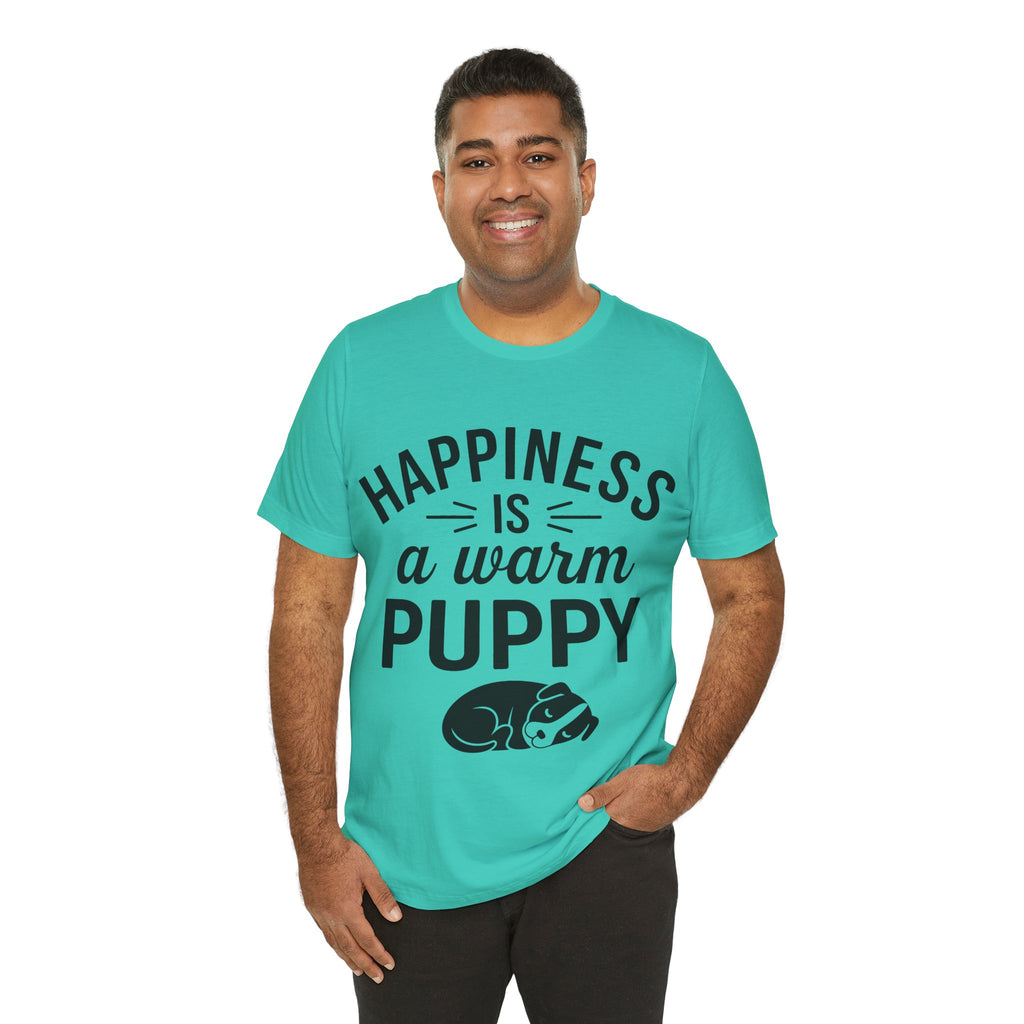 Man wearing a turquoise t-shirt with 'Happiness is a warm puppy' text and graphic on a white background
